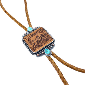 Detail of Mare and Foal bolo with Carico Lake turquoise and western leather belt insert, brown braided leather, handcrafted Western jewelry
