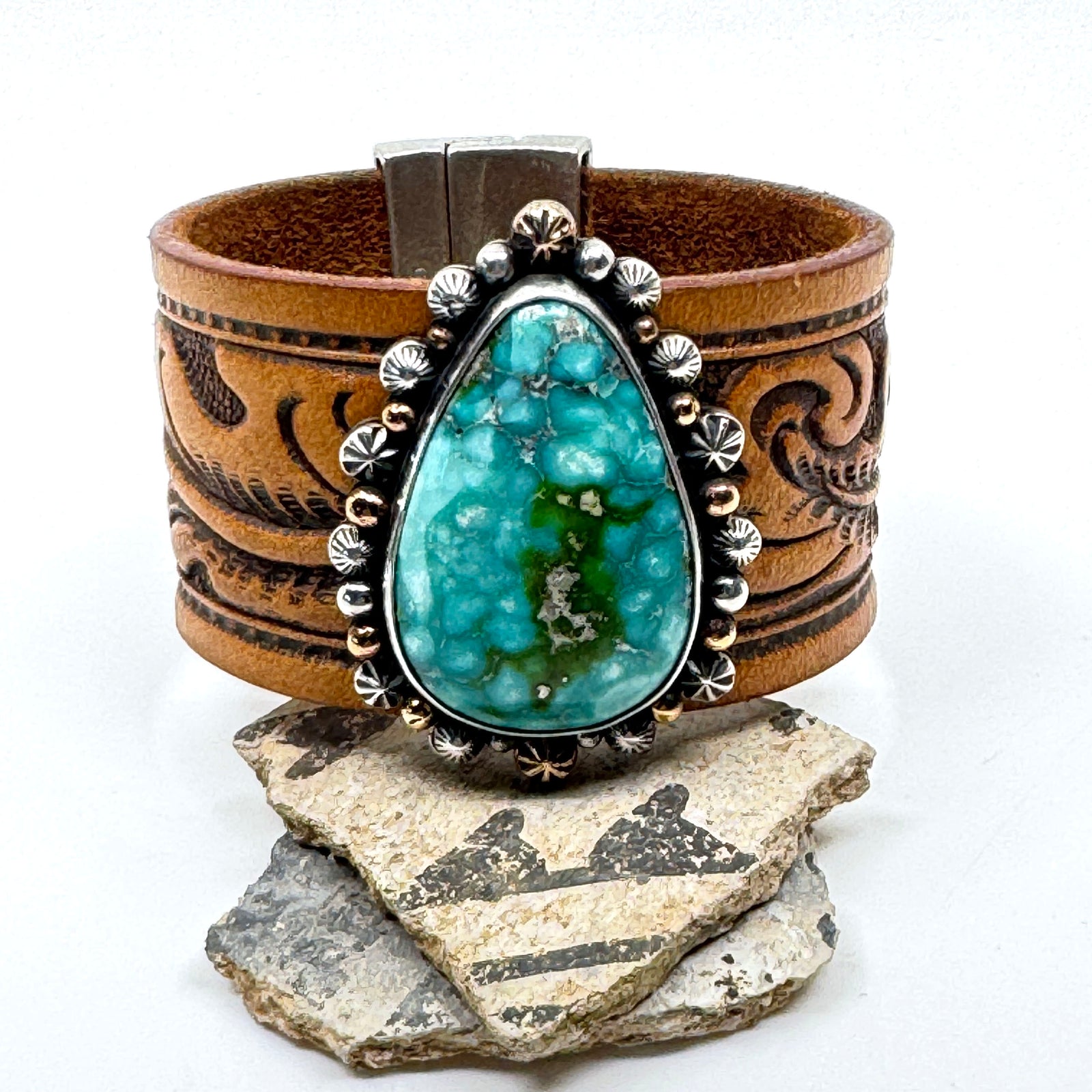 Leather cuff bracelet with Sonoran Gold turquoise stone on western leather belt
