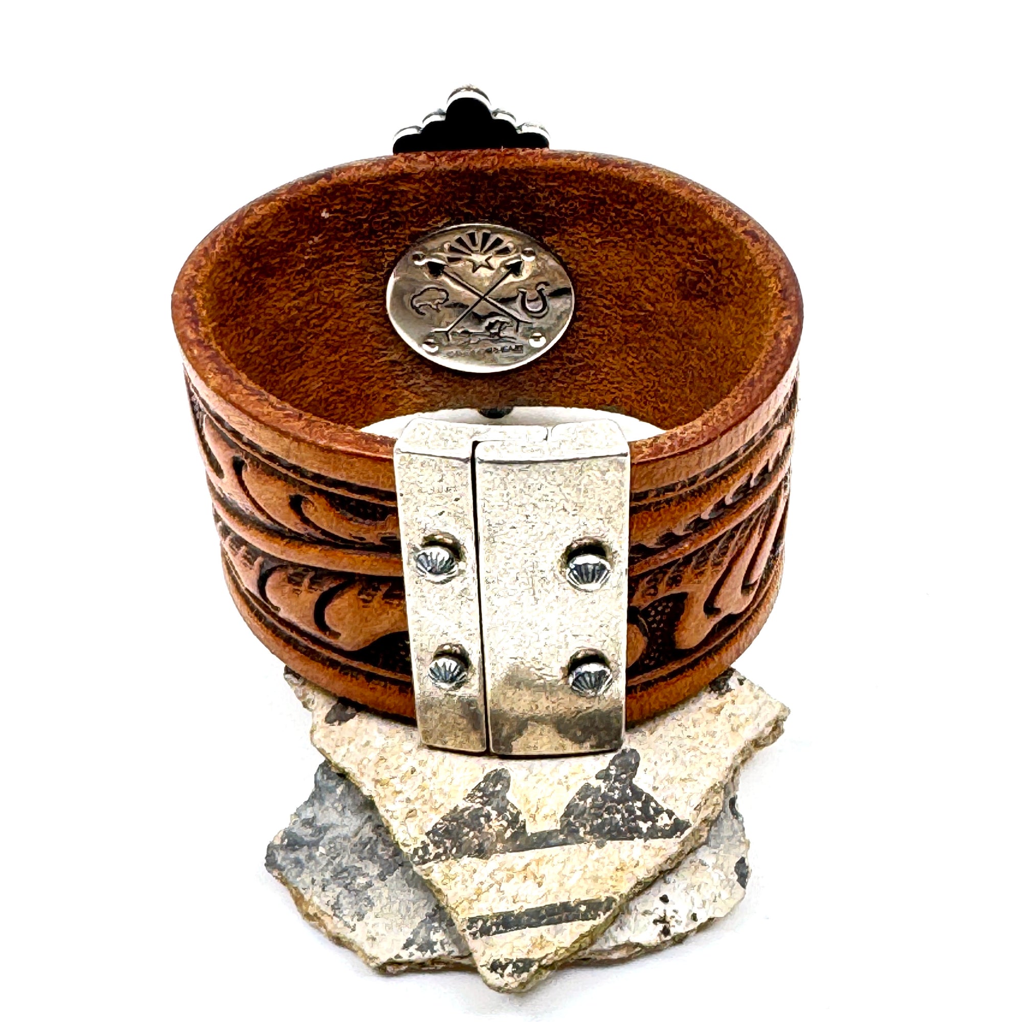 Magnetic clasp on western leather cuff
