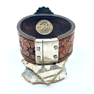Magnetic clasp on western leather cuff
