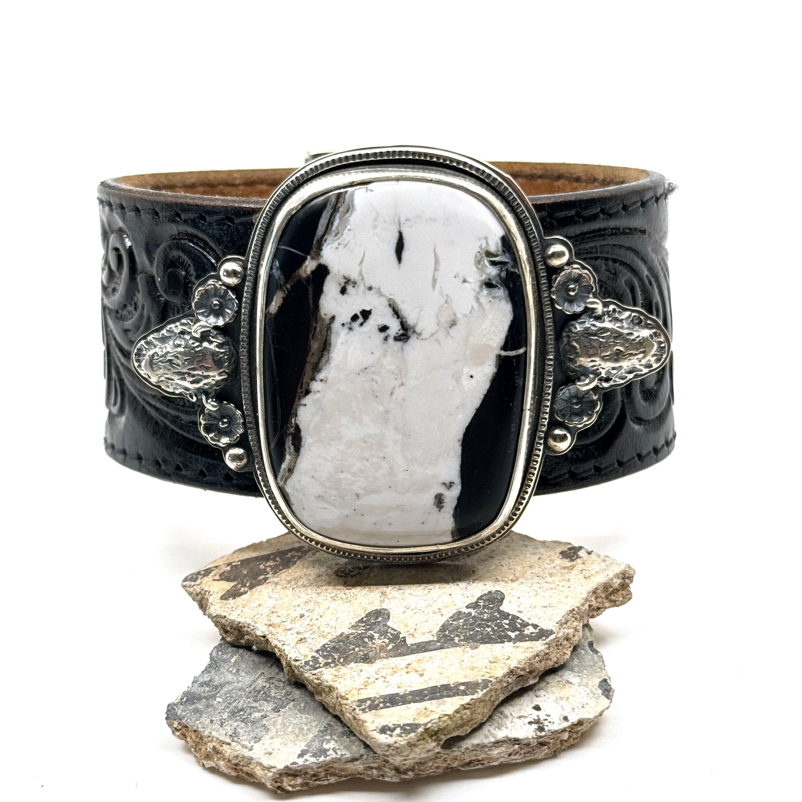 Leather cuff bracelet with White Buffalo stone on black western leather belt