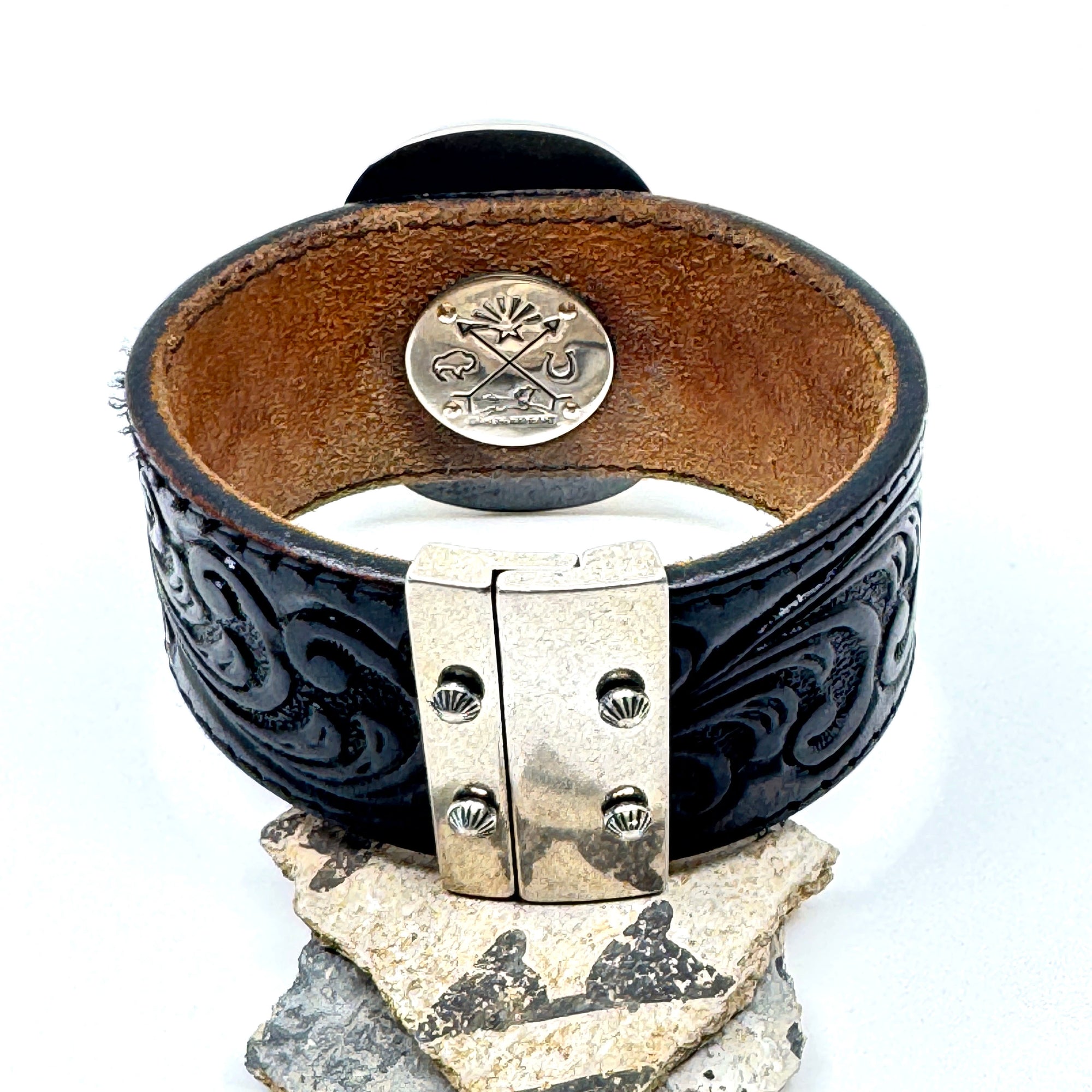 Magnetic clasp on western leather cuff
