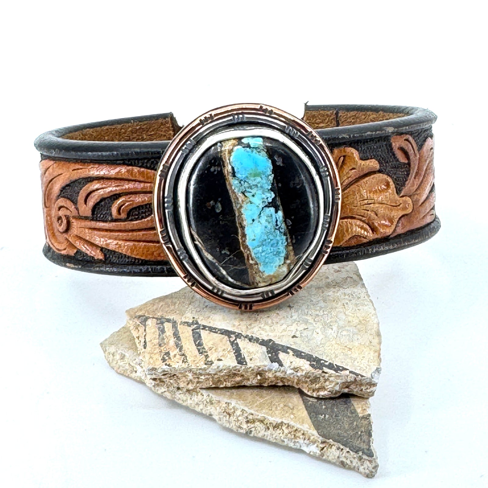 Leather cuff bracelet with Blackjack turquoise stone on floral western leather belt