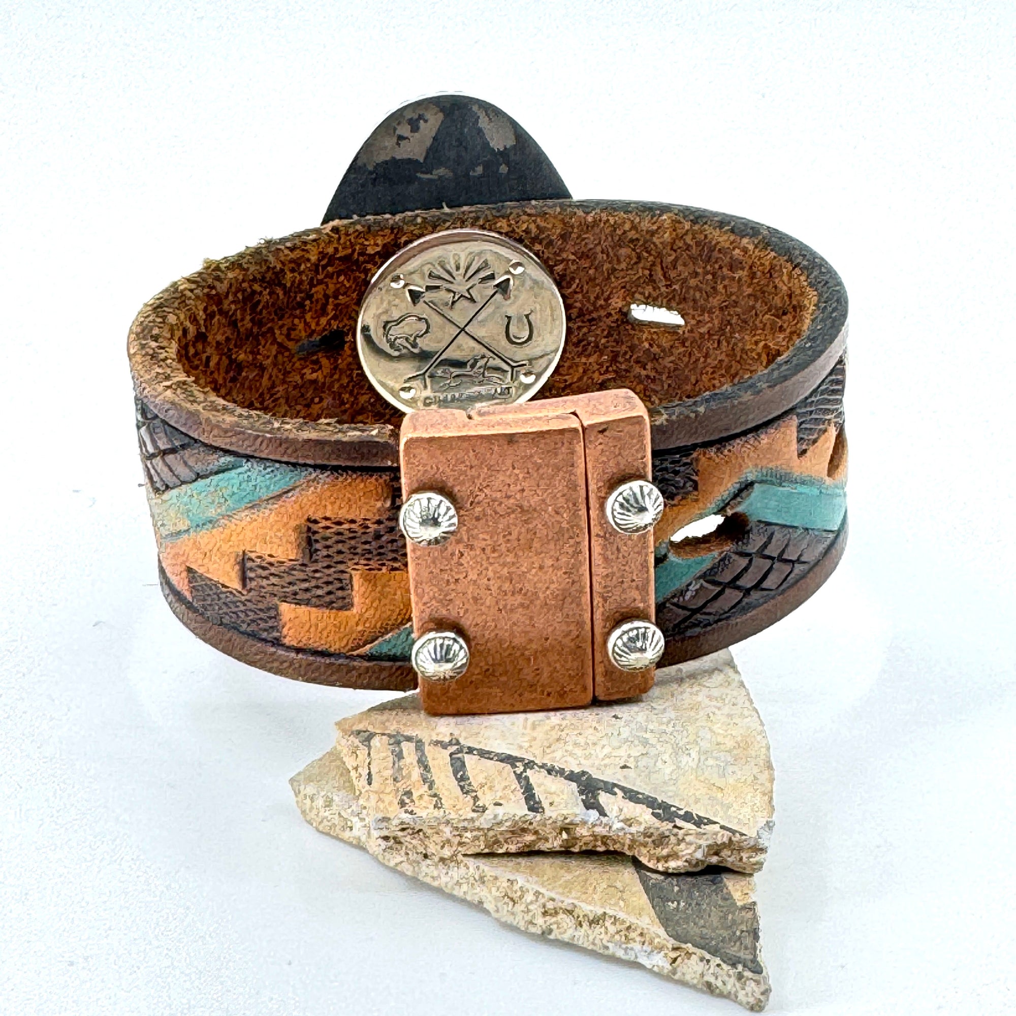 Magnetic clasp on western leather cuff
