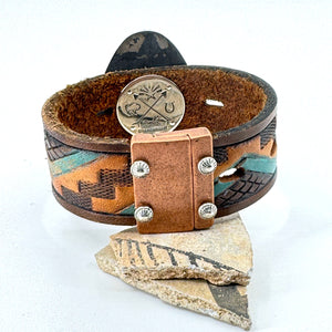 Magnetic clasp on western leather cuff

