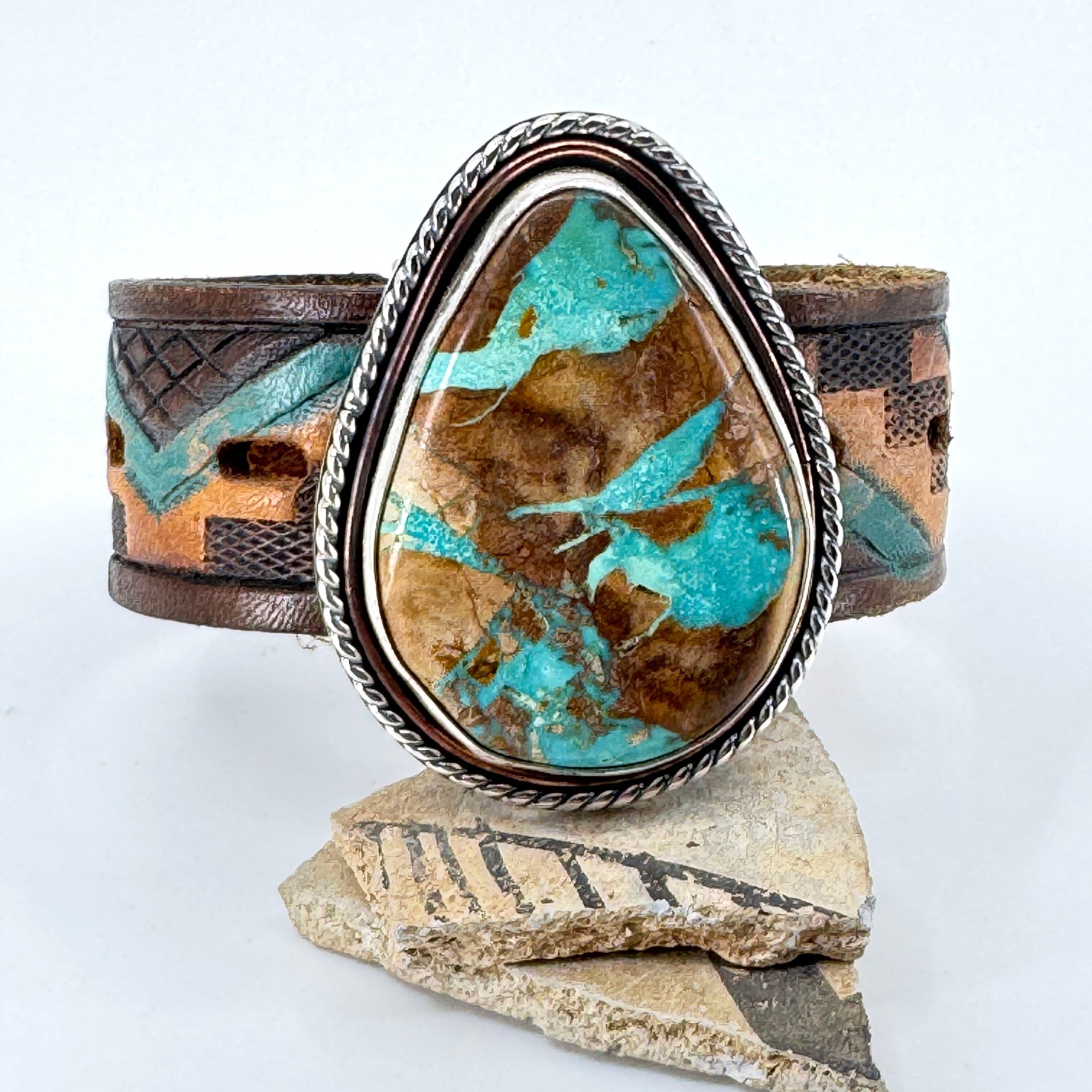 Leather cuff bracelet with Blue Moon turquoise stone on colorful southwestern leather belt