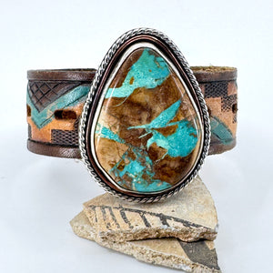 Leather cuff bracelet with Blue Moon turquoise stone on colorful southwestern leather belt