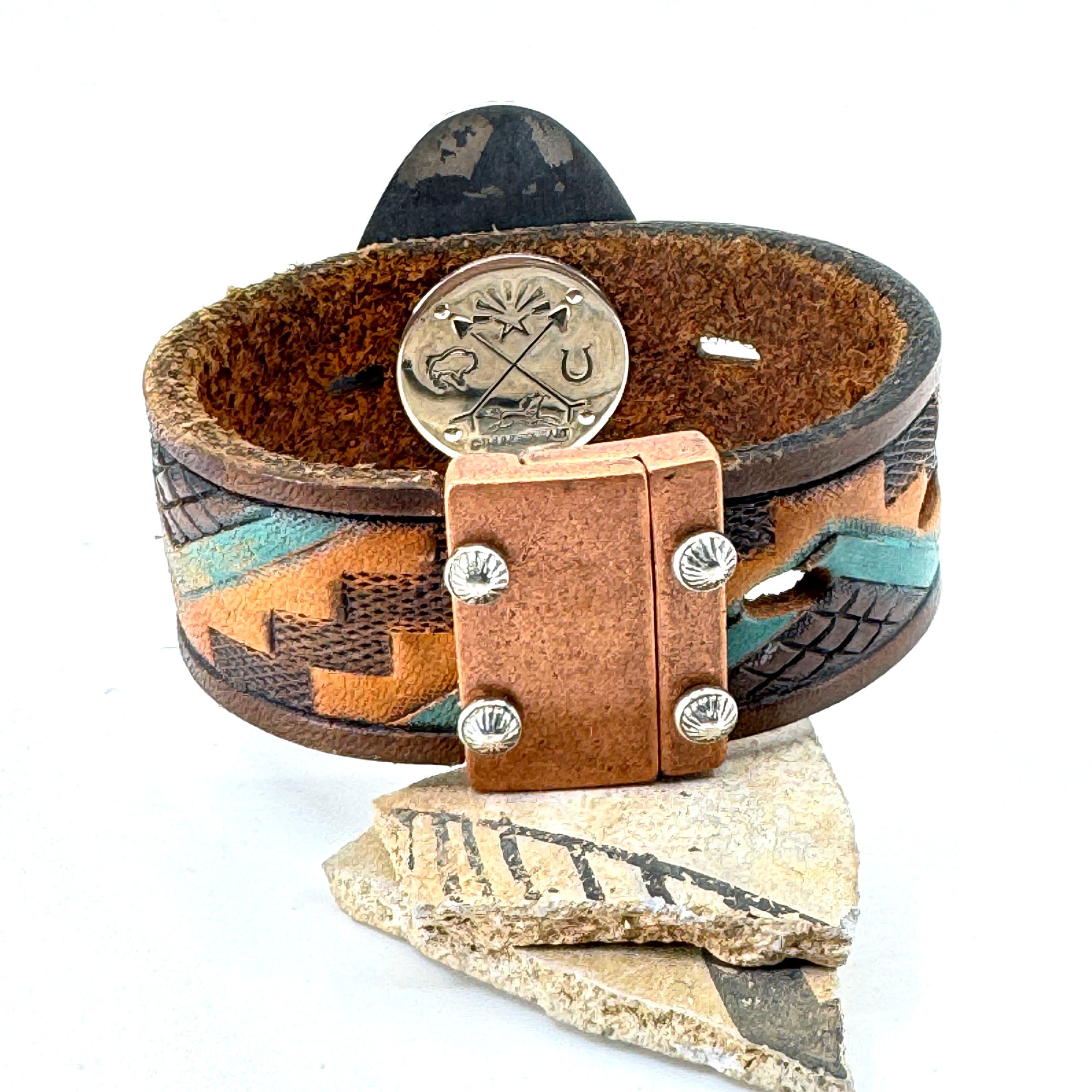 Magnetic clasp on western leather cuff
