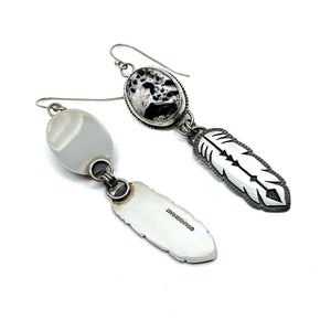 Handcrafted White Buffalo Feather Earrings in sterling silver. Western elegance meets free-spirited style—authentic jewelry made in Arizona.
