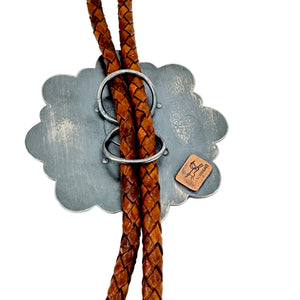 Back of Bolo tie with braided brown leather straps and metal slide