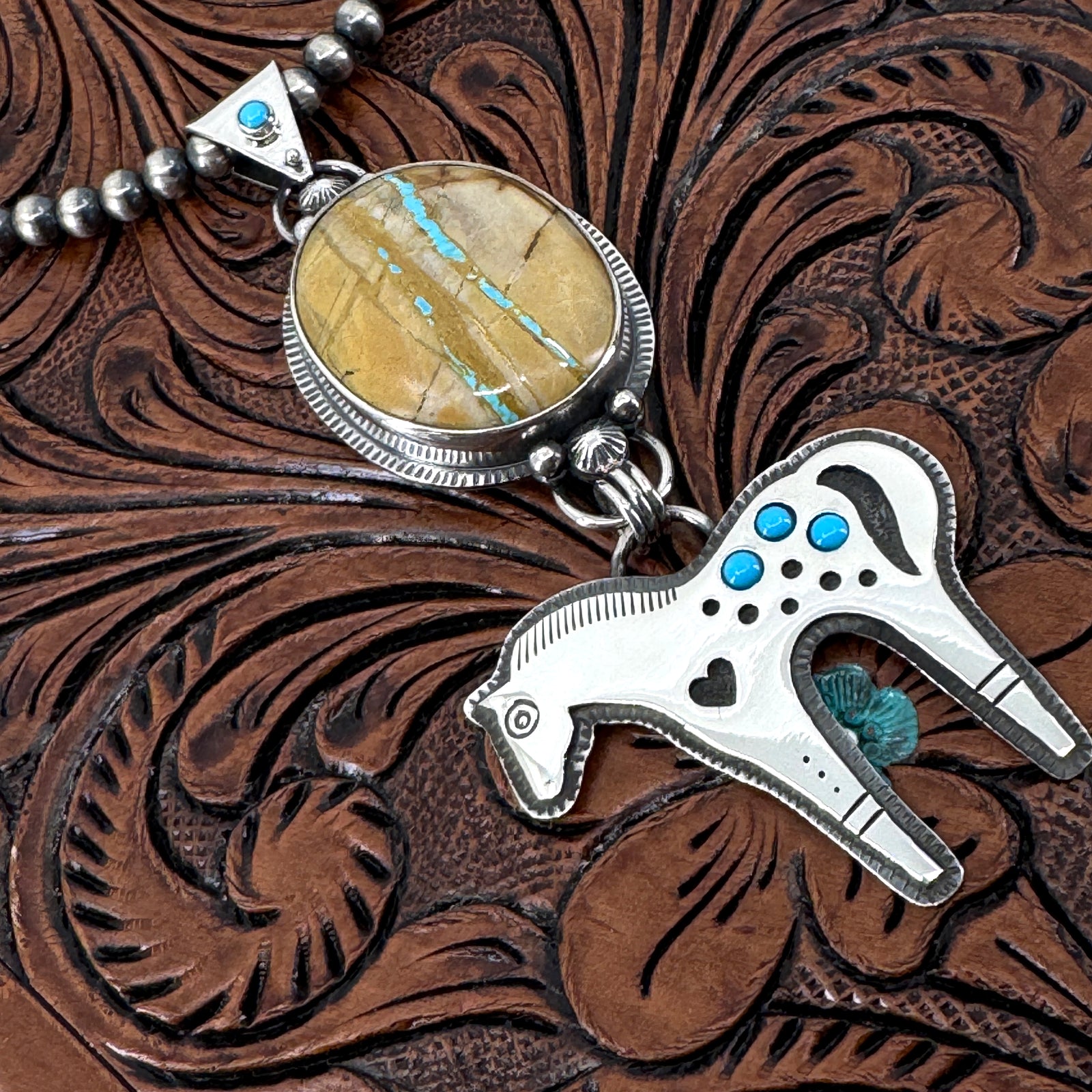 Detail of Appaloosa necklace featuring Royston ribbon and Sleeping Beauty turquoise on Navajo Pearls, handcrafted Western jewelry