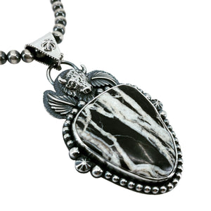 Detail of White Buffalo Lightning necklace with cast sterling silver buffalo and Navajo pearls, handcrafted Western jewelry