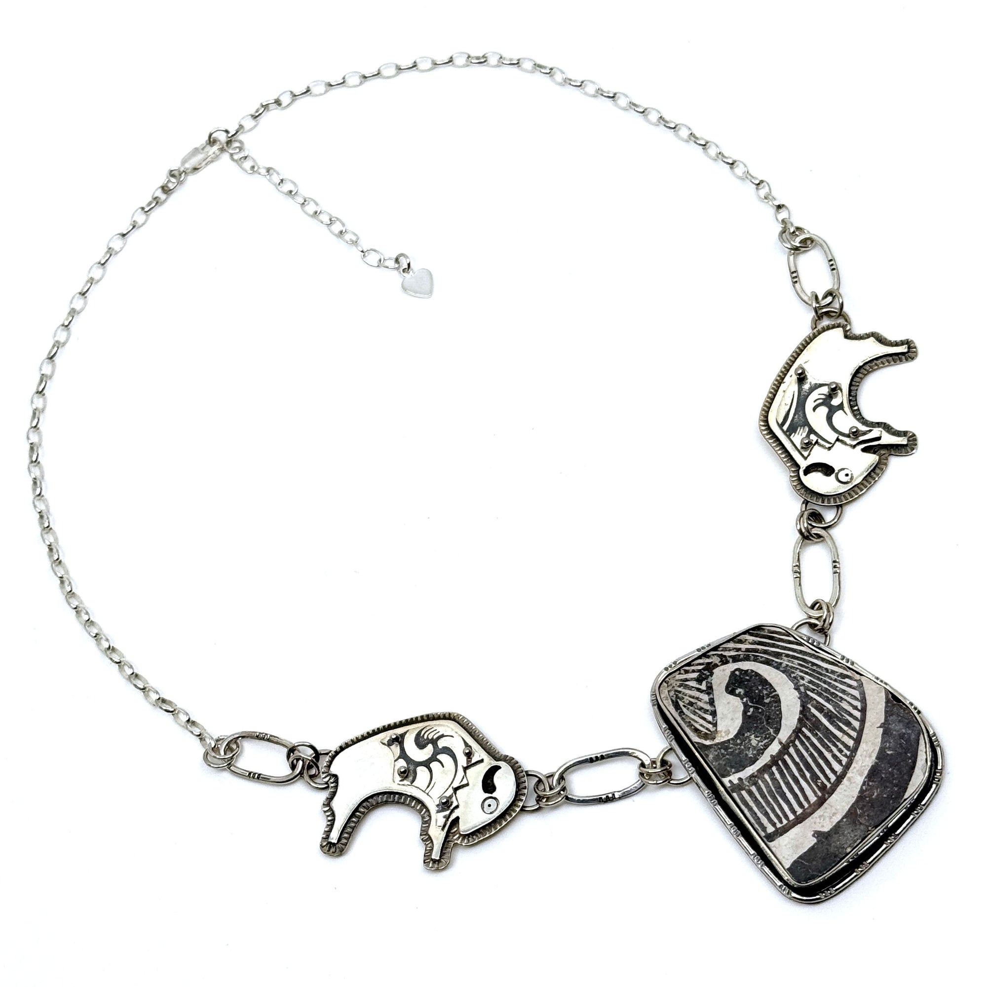 Sterling silver overlay buffalo necklace with authentic pottery shard, handcrafted by Thunderheart Jewelry in Arizona.