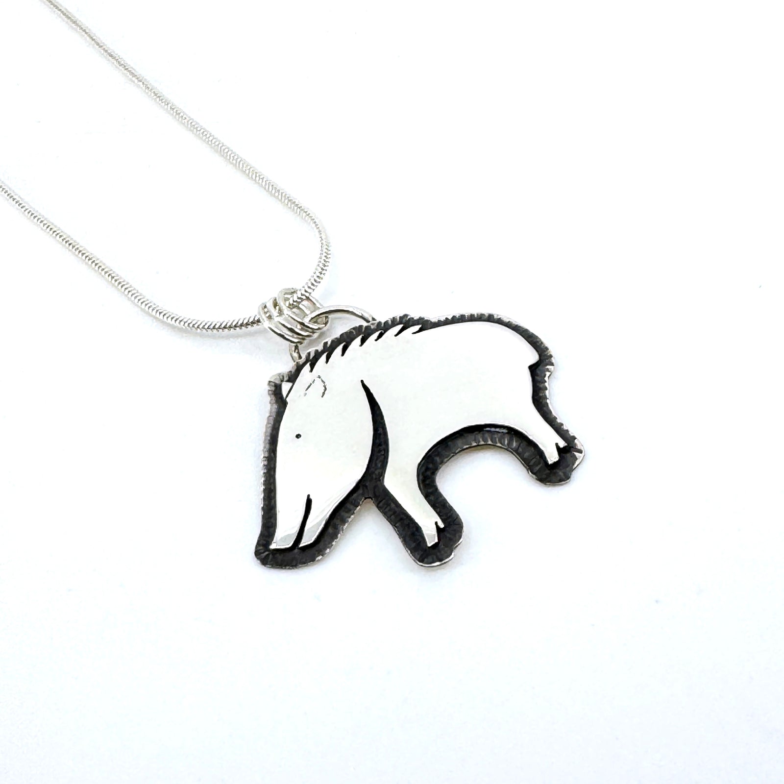 Sterling silver overlay Happy Javelina necklace on adjustable sterling chain, handcrafted by Thunderheart Jewelry in Arizona