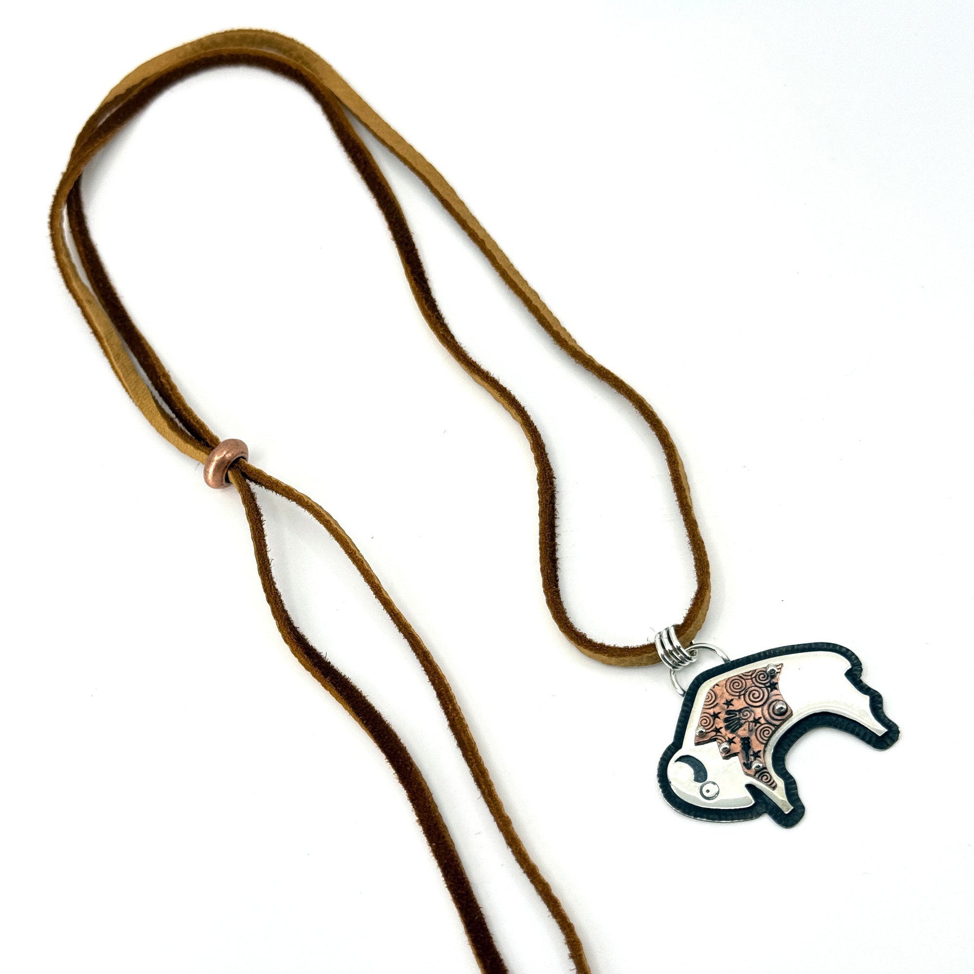 Sterling silver overlay buffalo necklace with copper detail, handcrafted by Thunderheart Jewelry in Arizona