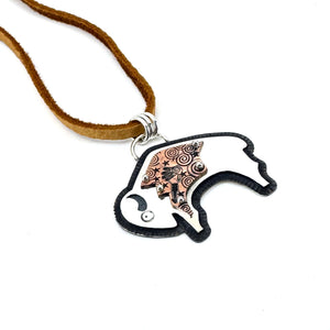 Detail of sterling silver overlay buffalo necklace with copper detail, handcrafted by Thunderheart Jewelry in Arizona